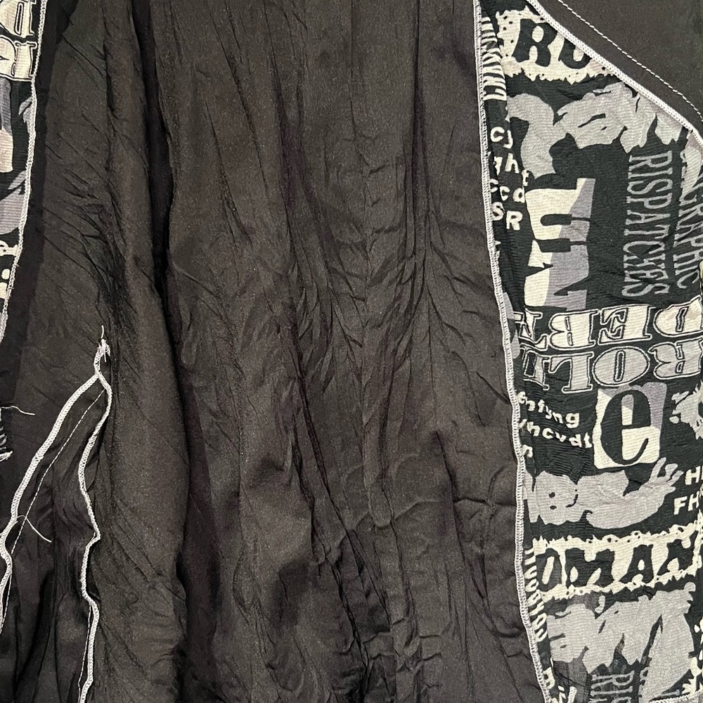 Newspaper dress with black and white patchwork layers - Picture 8 of 10